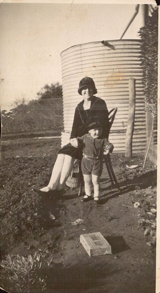 Alex's wife Olive and eldest child Paddy at the original homestead.